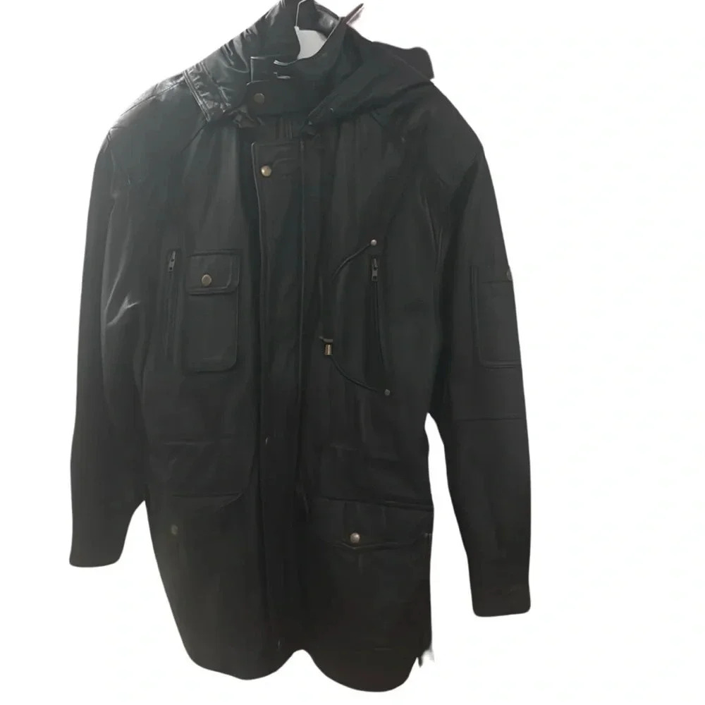 Vintage leather men’s jacket biker style Sz Small. Lots of pockets and has hood.